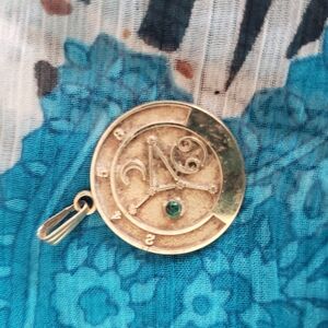 Gold Zodiac Pendant with Green Gem